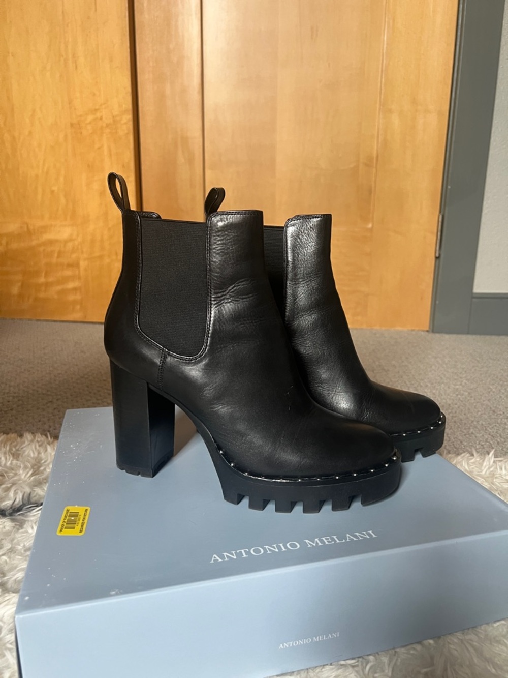 ANTONIO MELANI Black Leather Chelsea Ankle Booties with Stud Accents